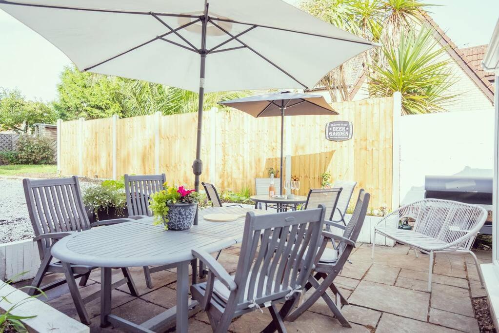 Modern By Sandy Beach, In Vibrant Village; Holiday home